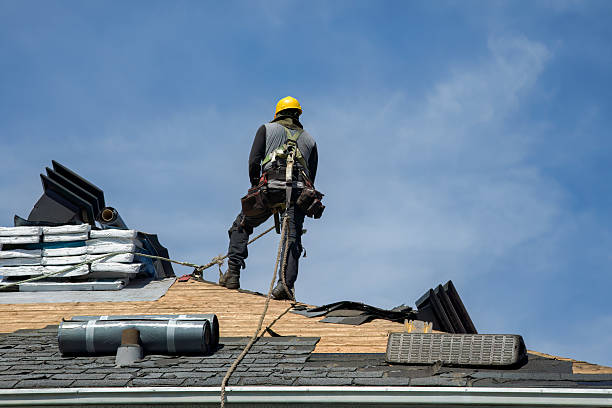 Professional Roof Replacement technician working in Detroit, OR